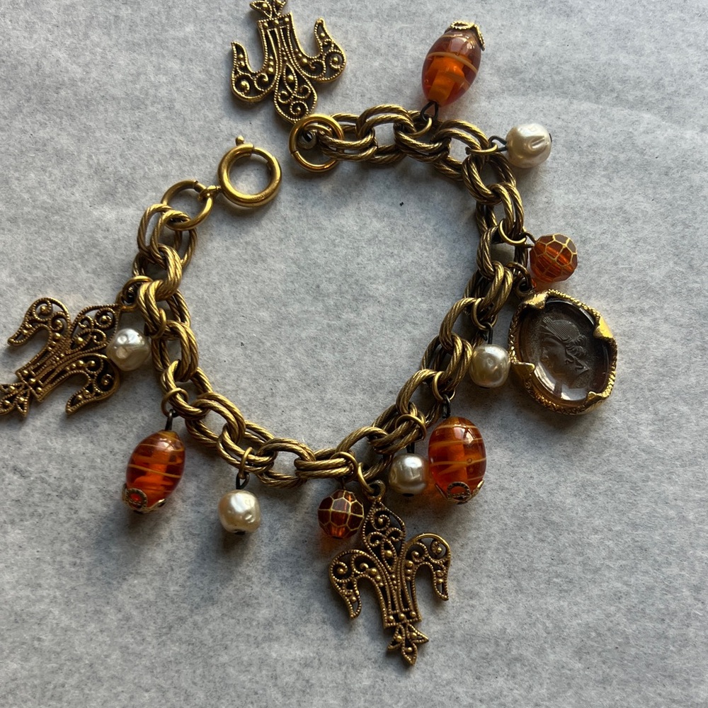 Elegant Gold and Amber Charm Bracelet
